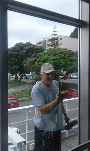 Window Cleaner using a squeegee