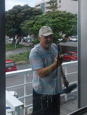 Window Cleaner using a squeegee